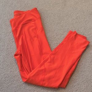UnderArmour Bright Orange/Red Workout mid Calf Leggings, Medium